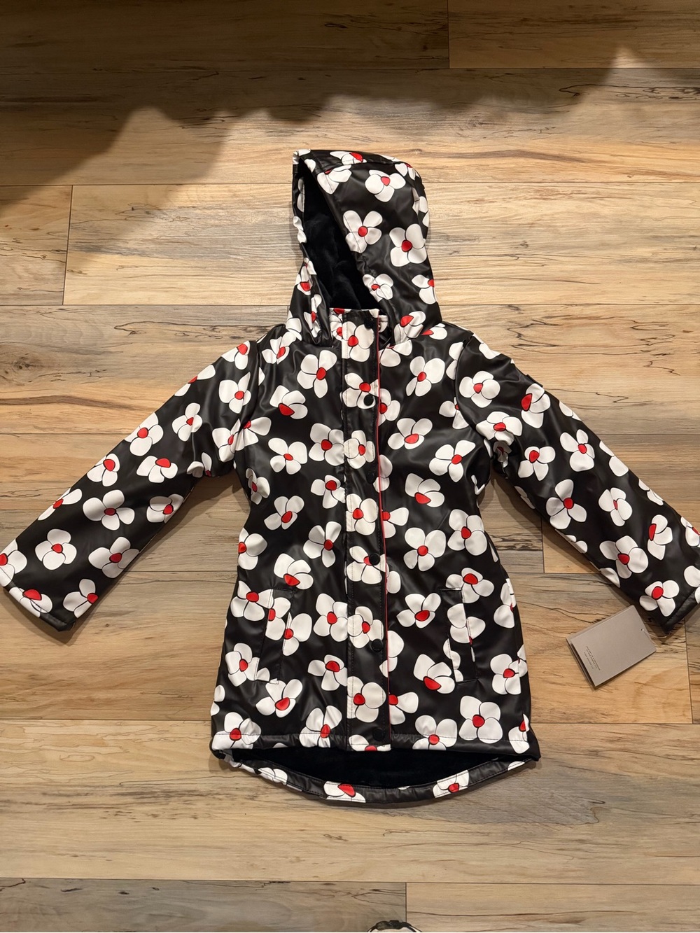 Hunter Black Floral Raincoat with White Flowers and Red Centers